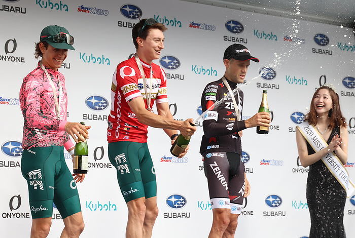 2022 Japan Cup Cycle Road Race October 16, 2022, Utsunomiya, Japan    L R  Italian cyclist Andrea Piccolo of EF Education Easypost, American cyclist Neilson Powless of EF Education Easypost and Australian Benjamin Dyball of Team Ukyo spray sparkling wines as they won the Japan Cup Cycle Roadrace in Utsunomiya, 100km north of Tokyo on Sunday, October 16, 2022. Powless won the race while his teammate Piccolo finished the second and Dyball finished the third.       Photo by Yoshio Tsunoda AFLO  