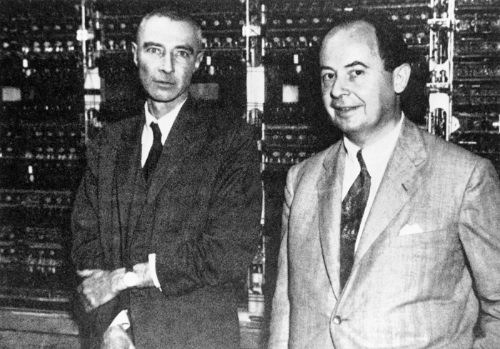 Robert Oppenheimer  date of filming unknown   BJ. Robert Oppenheimer and John Von Neumann. b View of two of the principal members of the Manhattan Project, J. R. Oppenheimer  left, 1904 1967  and John Von Neumann  right, 1903 1957 . This project was started in 1942, in Los Alamos, New Mexico, USA, in order to develop, construct and test the atomic bomb. Oppenheimer, who studied under well known physicists such as Rutherford, Heisenberg and Dirac, was nominated director of the Manhattan Project in 1943. His knowledge was of great importance in the design of the implosion device used for the plutoniumium plutonium project in 1943. His knowledge was of great importance in the design of the implosion device used for the plutonium bomb.