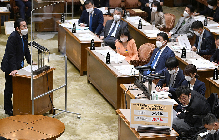 Budget Committee of the upper house of the Diet  one half of the yosaniinkai  Prime Minister Fumio Kishida  back left  answers questions from Daisuke Amabatake  front right  of Reiwa Shinsengumi at the Budget Committee of the House of Councillors, October 2022 in the Diet. 4:19 p.m., October 20, 2022  photo by Mikiharu Takeuchi