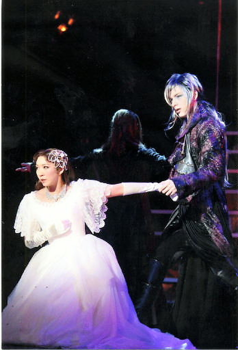 Sena and others playing Queen Elisabeth From the musical  Elisabeth  Jun Sena  left , who plays Queen Elisabeth of the Habsburg Empire, and Yu Shirota, who plays Toto. Photo taken on August 19, 2010 at the Imperial Theatre in Hibiya, Tokyo.