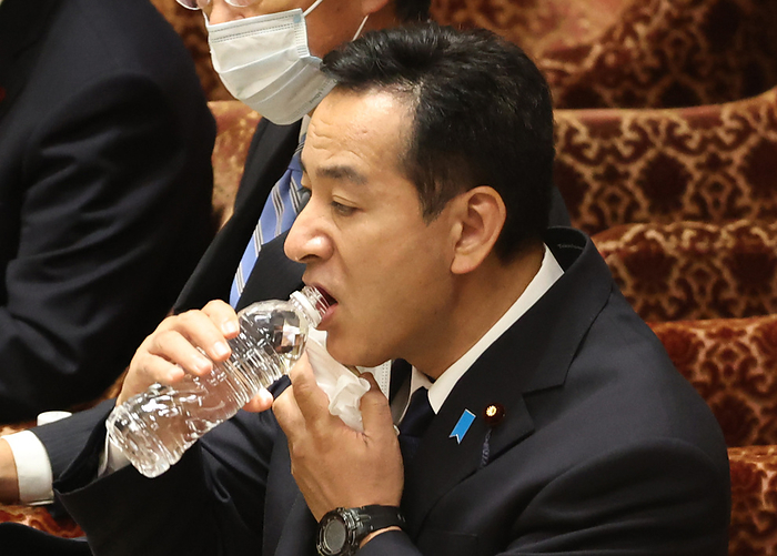 Prime Minister Fumio Kishida attends Lower House s budget committee session October 24, 2022, Tokyo, Japan   Japanese Fiscal Policy Minister Daishiro Yamagiwa drinks water as he listens to a question at Lower House s budget committee session at the National Diet in Tokyo on Monday, October 24, 2022. Yamagiwa expressed his resignatin to the prime minister for the connection with the controversial Unification Chruch.    Photo by Yoshio Tsunoda AFLO 