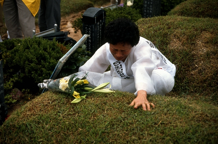   South Korea: 1983, Gwangju   Three years after the 1980 Guwangju Uprising, Korean women grieve the death of the members of their families at the cemetery outside this central South Korean city of Gwangju. Some 2,000 people were estimated to have killed in the uprising against the military regime of President Chun Doo hwan.  Photo by Fujifotos AFLO  FYJ
