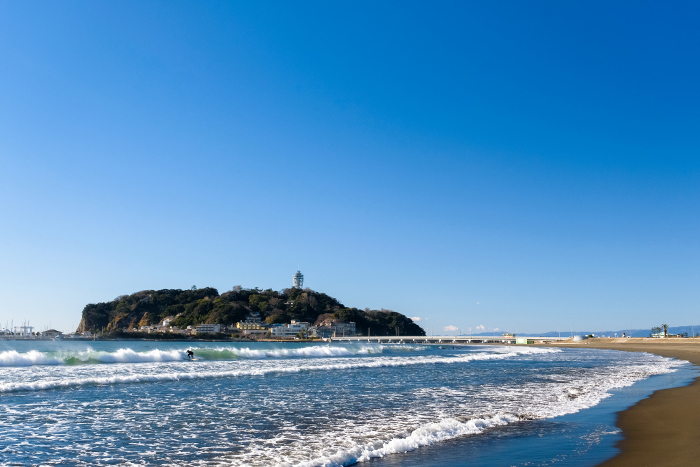 Enoshima and Katase Higashihama Beach under a blue sky, Fujisawa City, Kanagawa Prefecture