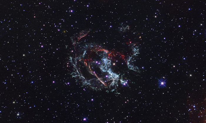 Supernova Remnant 1E 0102, composite HST image Composite Hubble Space Telescope  HST  image of supernova remnant 1E 0102, located in the Small Magellanic Cloud  SMC . Supernova remnant 1E 0102 is the gaseous remains of an exploded massive star that erupted approximately 1,700 years ago. This composite is made of separate red, green and blue filtered exposures taken with the Wide Field Camera 3., by NASA ESA STScI SCIENCE PHOTO LIBRARY