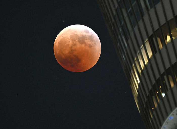 Total lunar and planetary eclipses observed in Japan for the first time in 442 years A full moon that became a total lunar eclipse beside the Tokyo Sky Tree. The brighter star on the lower left of the moon is Uranus before it is hidden by the moon on the afternoon of November 8, 2022 in Sumida ku, Tokyo. Photo by Koichiro Tezuka at 7:16 p.m.