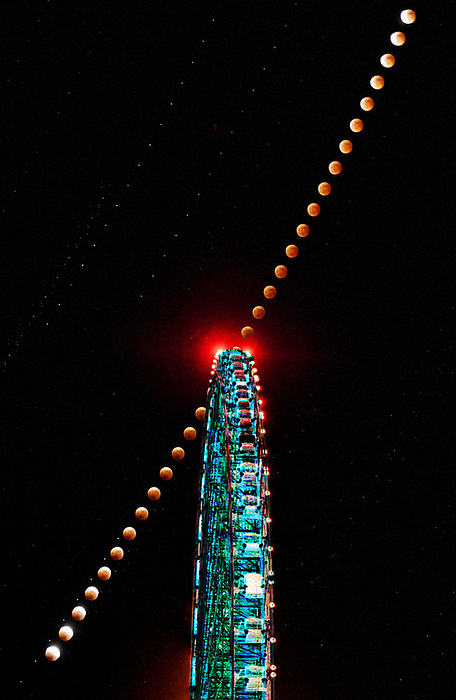 Total lunar eclipse observed in various parts of Japan Full moon from partial lunar eclipse  lower left  to total lunar eclipse and back to partial lunar eclipse. In the foreground is the Red Horse Osaka Wheel, a large Ferris wheel  from 6:49 p.m. to 8:57 p.m., 4 min.  Composite of images taken at 4 minute intervals from 6:49 p.m. to 8:57 p.m., November 8, 2022, in Suita City, Osaka Prefecture  photo by Kazuteru Yamazaki .