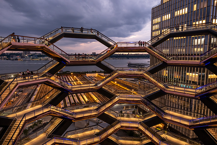 Modern architecture building Vessel spiral staircase is the centerpiece of the Hudson Yards in New York City Modern architecture building Vessel spiral staircase is the centerpiece of the Hudson Yards in New York City