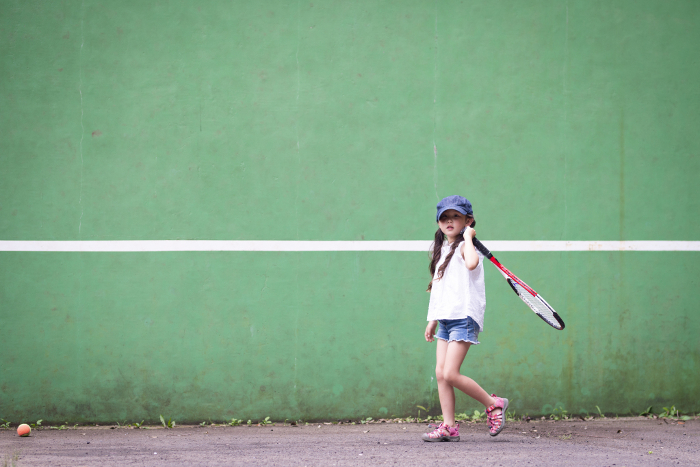Girl with tennis racket