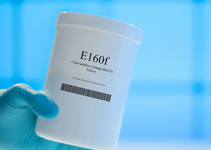 Container of the food additive E160f Container of the food additive E160f, a colour additive  orange red to yellow ., by WLADIMIR BULGAR SCIENCE PHOTO LIBRARY