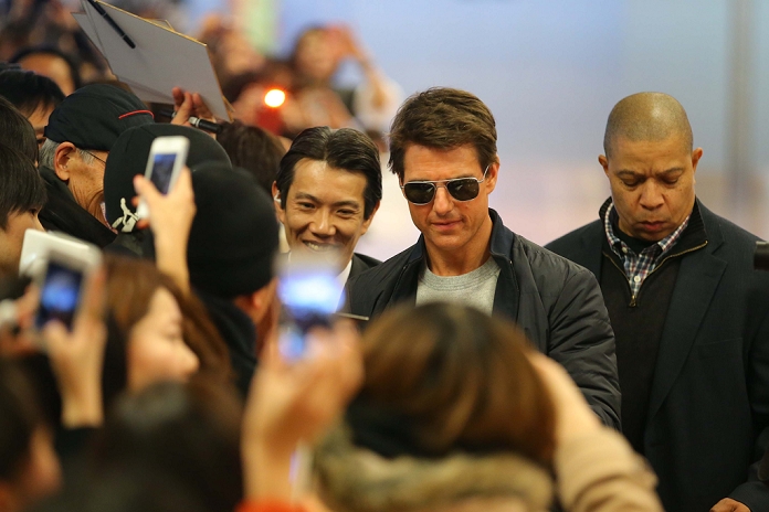 Tom Cruise, Jan 08, 2013 : 2013, January 8th, Tokyo, Japan: Tom Cruise arrives at Haneda Airport, Tokyo, Japan on Tuesday 8th January 2013. Tom Cruise is visiting to promote his latest movie Jack Reacher entitled Outlaw for the Japanese market. He will hold a press conference on Wednesday 9th January before the Japan Premiere. Cruise flew in on a private jet but this didn't stop many fans and press making it there to greet him. As ever he was all smiles with the Japanese media and remains very popular here. (Photo by Yohei Osada/AFLO)