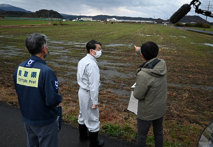 Governor Shinji Hirai  center  visits a poultry farm near where the bird flu outbreak occurred. Governor Shinji Hirai  center  visits a poultry farm near where the bird flu outbreak occurred, in Tottori City, Japan, at 7:11 a.m. on December 1, 2022  photo by Yasumasa Yamada .