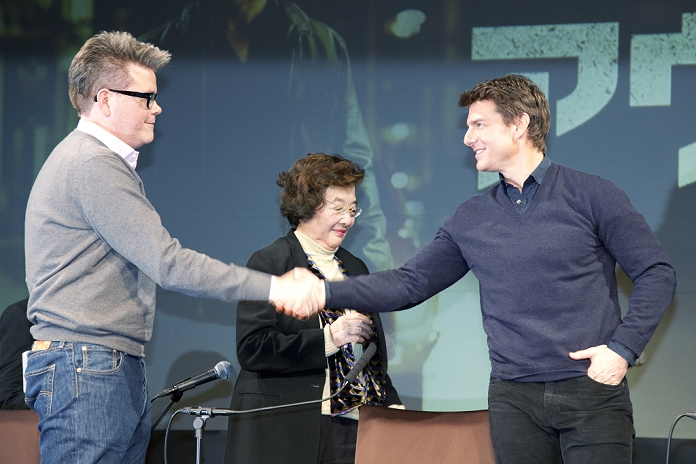 Christopher McQuarrie and Tom Cruise, Jan 09, 2013 : Tokyo, Japan - (L-R) Christopher McQuarrie and Tom Cruise shake hands on stage during a press conference for 