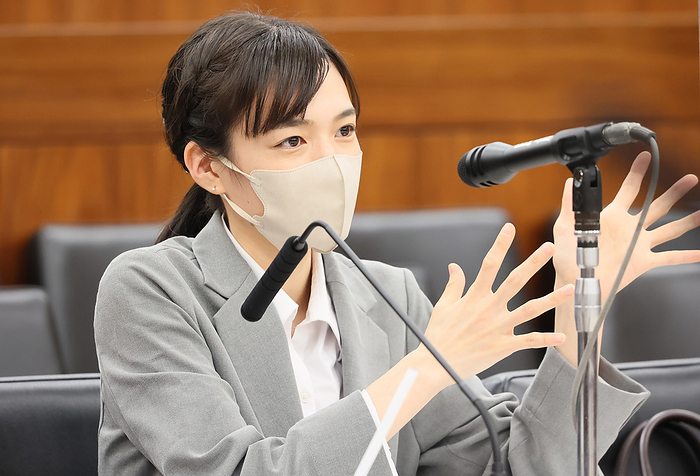 A second generation follower attends a special committee session on consumer affairs for the bill to help Unification Church victims December 9, 2022, Tokyo, Japan   Sayuri Ogawa  pseudonym , second generation follower of a controversial cult Unification Church answers a question as an unsworn witness at Upper House s special committee session on consumer affairs at the National Diet in Tokyo on Friday, December 9, 2022.   Photo by Yoshio Tsunoda AFLO 