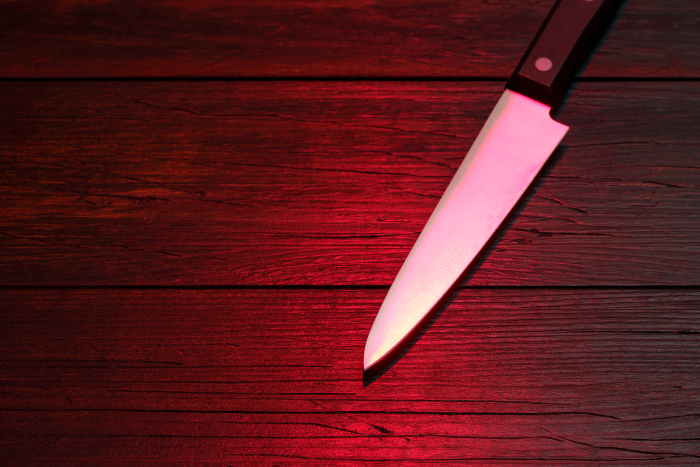 Dark background and knife