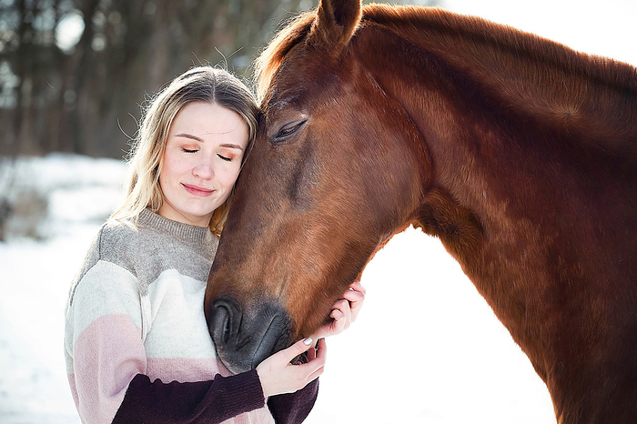 Warmblood young woman with horse, Photo by Tierfotoagentur   A. Zachrau
