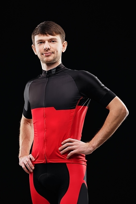 Sport. Cyclist in training clothes on black background, Photo by Aleksei Isachenko