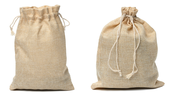 Full canvas bag tied with rope and isolated on a white background, set Full canvas bag tied with rope and isolated on a white background, set