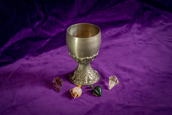 Tin goblet and four dowsing pendulums ade of different crystals   symbol fortune telling Tin goblet and four dowsing pendulums ade of different crystals   symbol fortune telling