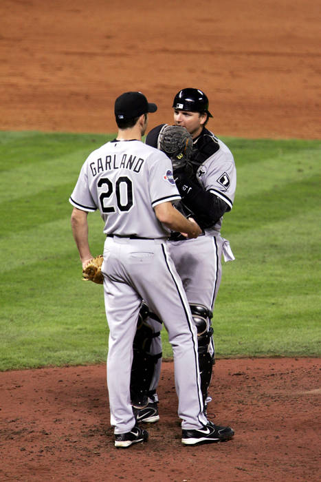  L R  Jon Garland, Chris Widger  White Sox , OCTOBER 25, 2005   MLB : Starting pitcher Jon Garland  20 of the Chicago White Sox meets with catcher Chris Widger  36 in between batters during Game Three of the 2005 Major League Baseball World Series against the Houston Astros at Minute Maid Park on October 25, 2005 in Houston, Texas. The White Sox defeated the Astros 7 5 in the fourteenth inning to take a 3 games to 0 series lead.   Photo by AFLO   672 