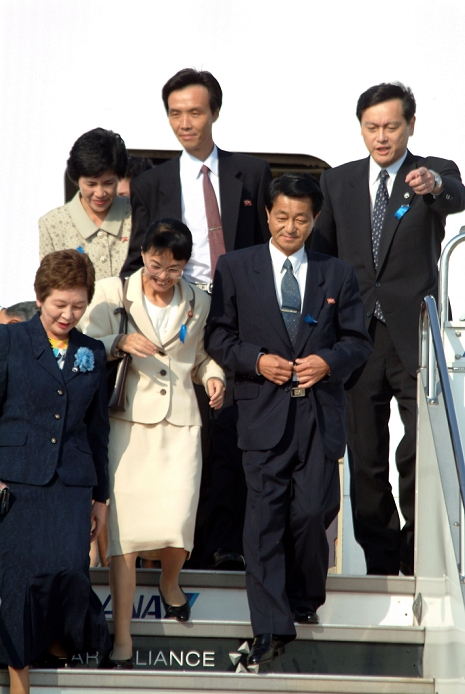 North Korean Kidnapped Victims Return to Japan  October 15, 2002  Japan: October 15, 2002, Tokyo   Yasushi Chimura and his wife,former Fukie Hamamoto, emerge from a government chartered plane upon their arrival at Tokyo s Haneda Airport. They and three other Japanese citizens who were abducted by North Korean spies returned to Japan for the first time in almost a quarter of a century.   Photo by Kaku Kurita AFLO  FYJ
