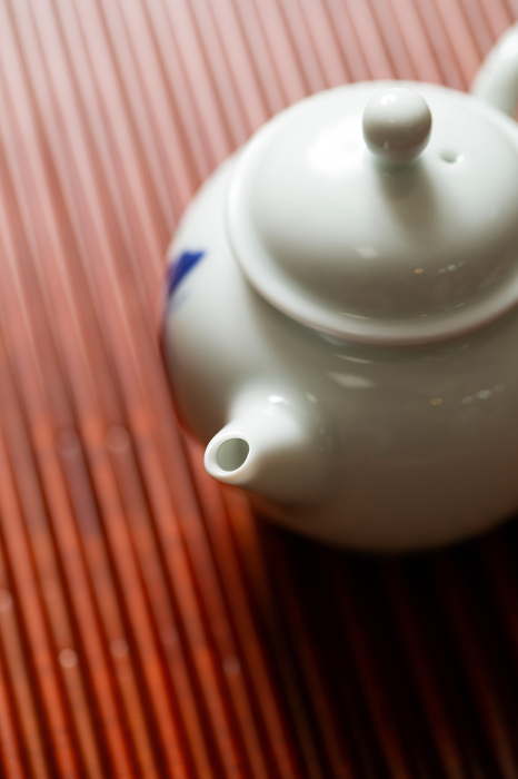 Tea pot chafu on tea board Chinese tea image