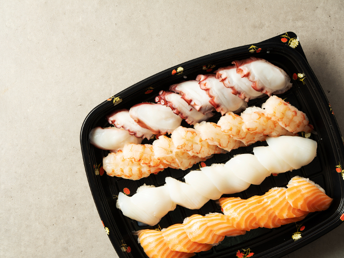Packed sushi with octopus and salmon