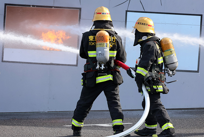 Tokyo Governor Yuriko Koike attends a fire brigade review January 6, 2023, Tokyo, Japan   Fire fighters demonstrate to spray water for firefighting at an annual fire brigade review in Tokyo on Friday, January 6, 2023. Some 2,500 personnel and 99 vehicles participated the New Year event.    Photo by Yoshio Tsunoda AFLO 
