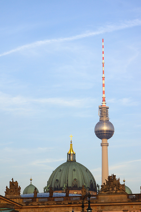 Domes of the Berlin Cathedral, behind it a television tower on Alexanderplatz Domes of the Berlin Cathedral, behind it a television tower on Alexanderplatz, Photo by Zoonar Erich Teister