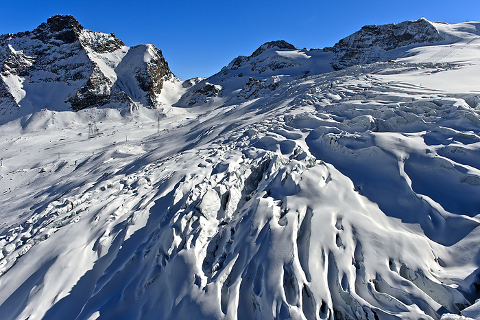 Glacial crevasse on the Feegletscher, Saas-Fee, Valais, Switzerland, Photo by Zoonar/Georg_A