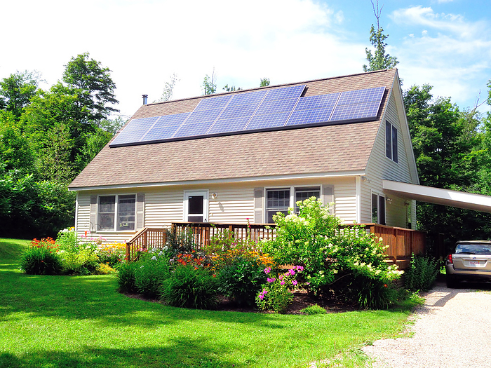 Suburban home with solar panels Suburban home with solar panels on the roof, Massachusetts, USA., by Joan Slatkin UCG Universal Images Group SCIENCE PHOTO LIBRARY