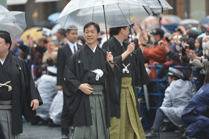 Emiya Ichikawa, Mar 27, 2013 : Tokyo, Japan - Kabuki actors during a parade in the rain through the main street of Tokyo's Ginza shopping district on Wednesday, March 27, 2013, in celebration of the grand opening of new Kabuki theater. After three years of renovation, the majestic theater for Japan's centuries-old performing arts of Kabuki will open its doors to the public with a three-month series of most sought-after plays.