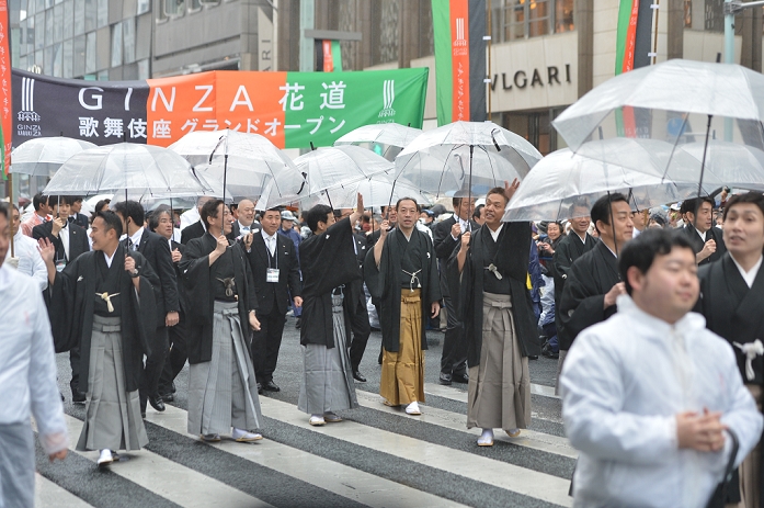 Ukon Ichikawa, Monnosuke Ichikawa, Komazo Ichikawa and Kamezo Kataoka, Mar 27, 2013 : Tokyo, Japan - Kabuki actors during a parade in the rain through the main street of Tokyo's Ginza shopping district on Wednesday, March 27, 2013, in celebration of the grand opening of new After three years of renovation, the majestic theater for Japan's centuries-old performing arts of Kabuki will open its doors to the public with a three-month series of most After three years of renovation, the majestic theater for Japan's centuries-old performing arts of Kabuki will open its doors to the public with a three-month series of the most sought-after plays.
