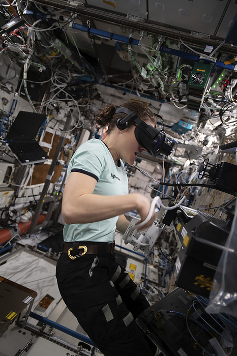 NASA wearing a virtual reality headset on the ISS Editorial use only   NASA astronaut and Expedition 59 Flight Engineer Christina Koch wearing a virtual reality headset for the Vection study. The study looks at how microgravity in space can affect an astronaut s visual ability to interpret motion, orientation and distance. Photographed on 19th March 2019. 