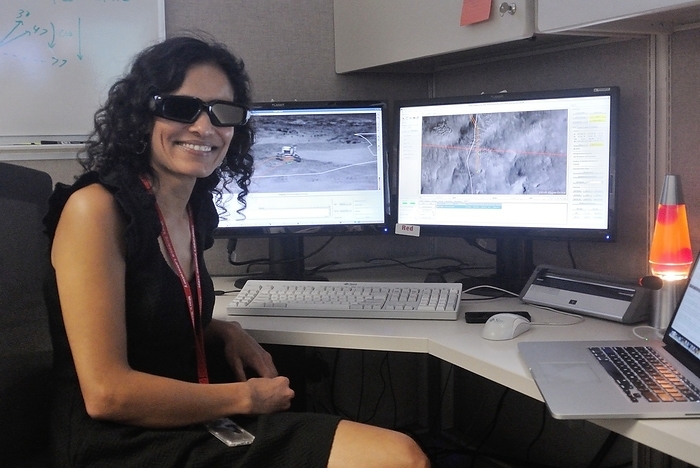 Engineer wearing 3D glasses to drive the Curiosity rover Editorial use only   NASA engineer wearing special 3D glasses to drive the Curiosity rover on Mars. These glasses used by rover drivers easily detect changes in terrain that the rover may need to avoid. Photographed o n 1st July 2021.