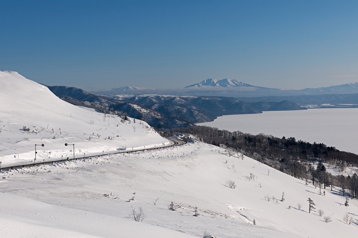 Shari-dake and Lake Kussharo from Bihoro Pass in winter, Hokkaido