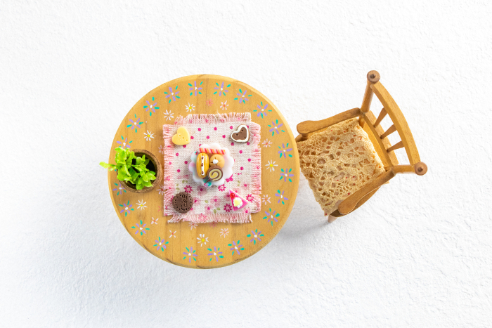 Miniature sweets set on table, overhead view