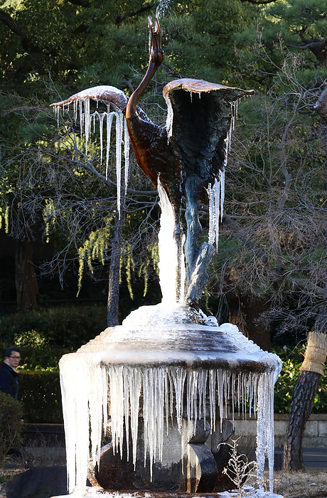 A frozen crane sculpture fountain hangs icicles from its wings January 26, 2023   A frozen crane sculpture fountain with icicles hanging from its wings at the Hibiya park in Tokyo on Thursday, January 26, 2023. A cold air wrapped wide area of Japan and subzero temperature was recorded in Tokyo.   Photo by Yoshio Tsunoda AFLO 