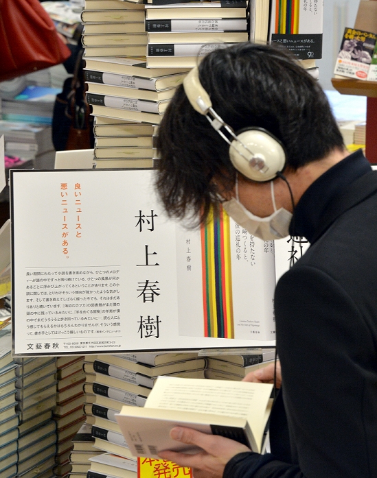 Haruki Murakami s new book on sale Circulation already 500,000 copies April 12, 2013, Tokyo, Japan   A Haruki Murakami fan leafs through a copy of his long awaited new novel at Sanseido book store in Tokyo on Friday, April 12, 2013.   The book, titled  Colourless Tsukuru Tazaki and His Years of Pilgrimage,  is the first work by Japan s most celebrated author in three years. A monumental number of copies   a half a million   has been printed.   Photo by Natsuki Sakai AFLO  AYF  mis 