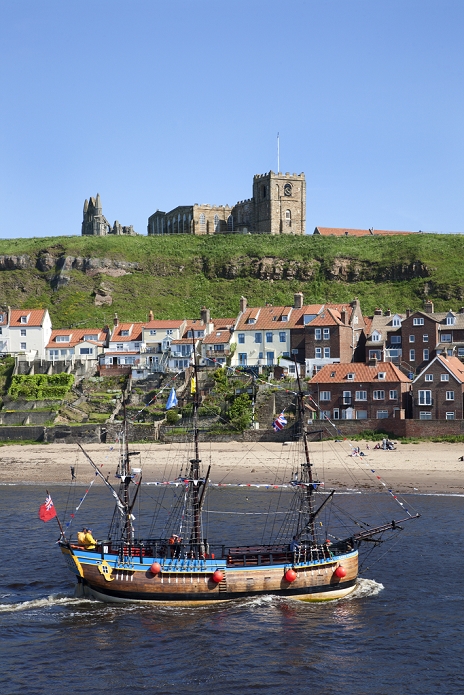 United Kingdom Pleasure ship below Whitby Abbey and St. Marys Church, Whitby, North Yorkshire, Yorkshire, England, United Kingdom, Europe