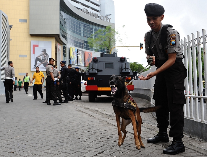 APEC Trade Ministers Meeting Opens Japan Pledges to Promote the TPP April, 20, 2013, Surabaya, Indonesia    Indonesian Police K 9 dog guard besides Grand City Convention Center building where 19 delegations of APEC attending in the APEC Ministers Responsible for Trade Meeting.  Photo by Robertus Pudyanto AFLO 
