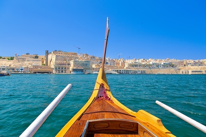 Traditional water taxi crossing the Grand Harbour, Valletta, Malta Traditional water taxi crossing the Grand Harbour, Valletta, Malta, Mediterranean, Europe, Photo by Barry Davis