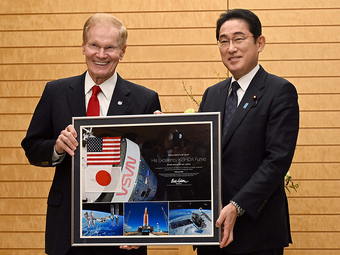 NASA Administrator Visits Japan Prime Minister Fumio Kishida receives a photo panel from NASA Administrator Nelson  left  at the Prime Minister s Office at 2:44 p.m. on February 6, 2023.