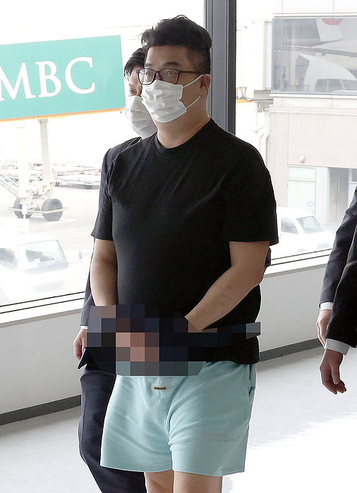 Wide area serial robbery case: Suspects Imamura and Fujita transported from the Philippines, arrested on board a plane. Suspect Mato Imamura arrives at Narita Airport after being transferred from the Philippines on February 07, 2023.