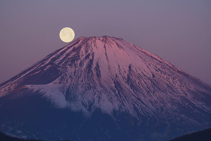 Red Fuji and the moon from Mt.