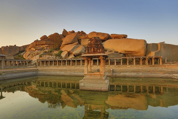 Karnataka, India South India, India, Karnataka State, Hampi City, ruins of Vijayanagar City XV century, W.H.,  Sunset at Sri Krisna Temple, Pushkarani