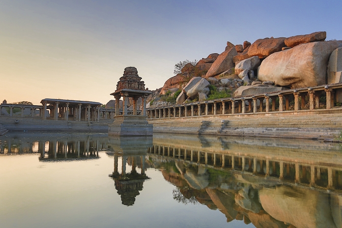 Karnataka, India South India, India, Karnataka State, Hampi City, ruins of Vijayanagar City XV century, W.H.,  Sunset at Sri Krisna Temple, Pushkarani