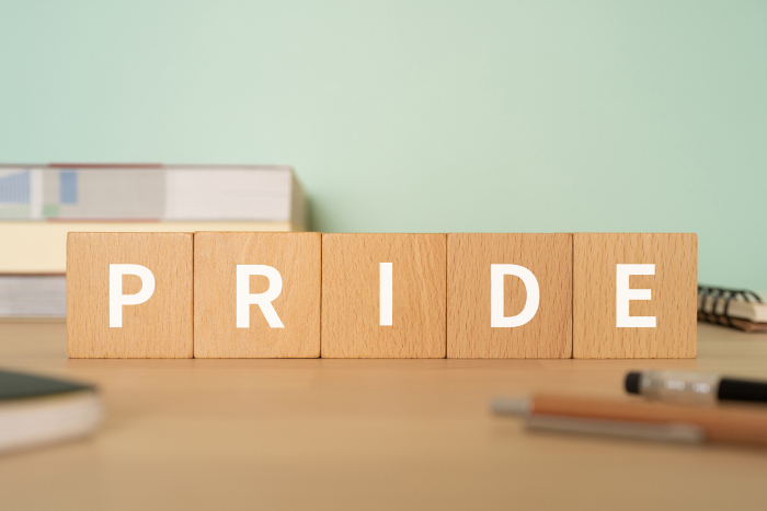 Desk with a block marked PRIDE