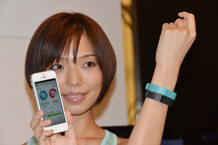 SB Announces Summer and Fall Models Announced health management service May 7, 2013, Tokyo, Japan   Softbank unveils a new line products for the summer and autumn seasons during a launch in Tokyo on Tuesday, May 7, 2013. Model showed  Fitbit Flex  at the rollout.  Photo by Koichi Mitsui AFLO 