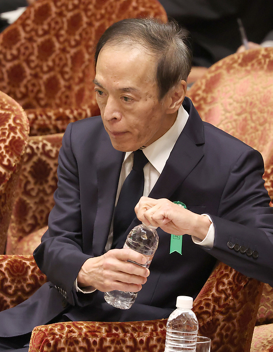 Hearings from candidates for BOJ Deputy Governor Kazuo Ueda, a candidate for the next Bank of Japan governor, drinks water at the House of Representatives Steering Committee on Feb. 24, 2023, in the National Diet.