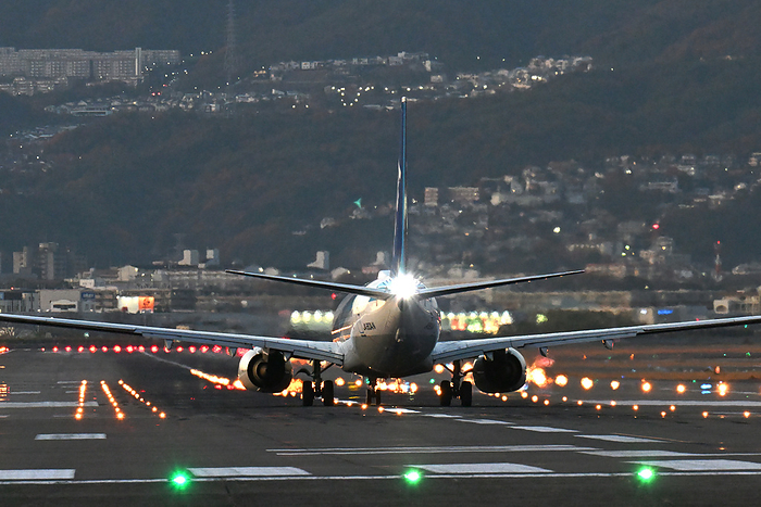 Hyogo Prefecture ANA Boeing 737 awaiting takeoff clearance Taken near Osaka International Airport  on the bank of Senri River 